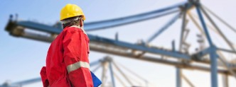 http://www.dreamstime.com/royalty-free-stock-photography-international-logistics-conceptual-image-featuring-docker-looking-unloading-container-ship-huge-cranes-image31136607